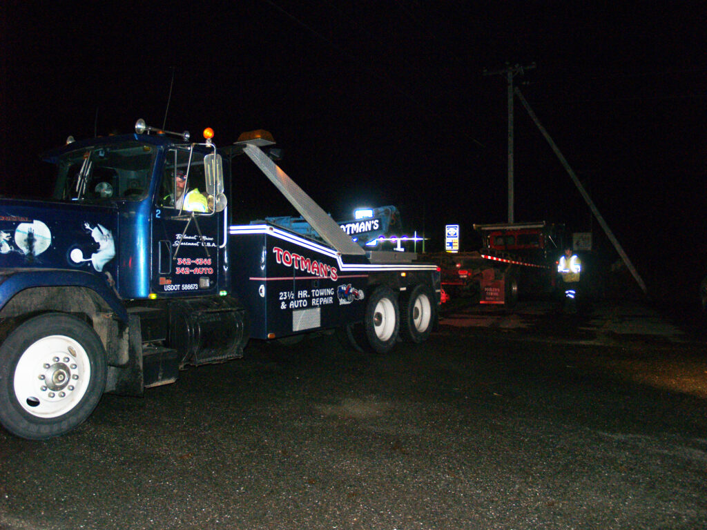 Towing With Ol' Blue - Totman Enterprises - Auto Repair, Foreign &  Domestic, New Tires, Emergency Towing & Recovery. Located in Belmont,  Maine, USATotman Enterprises – Auto Repair, Foreign & Domestic, New Tires,  Emergency Towing & Recovery ...